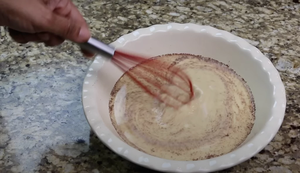 mixing the batter for French Toast